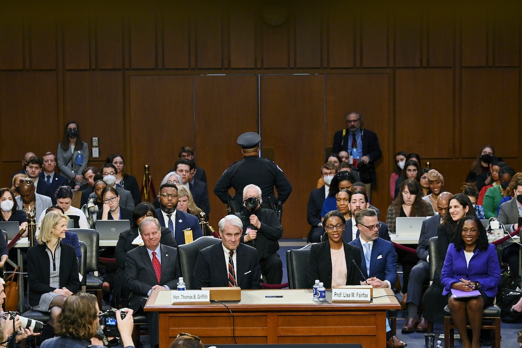 (Mandel Ngan | Pool) Retired Appellate Judge Thomas Griffith, left, introduces Supreme Court nominee Judge Ketanji Brown Jackson, far right, during her confirmation hearing before the Senate Judiciary Committee Monday, March 21, 2022, on Capitol Hill in Washington.