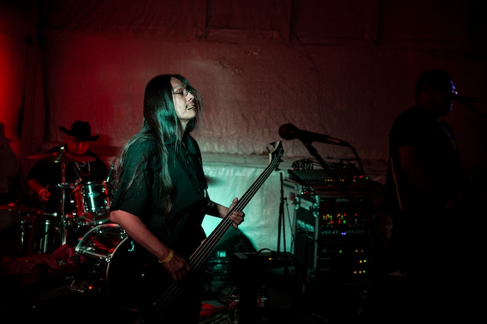 (Adriana Zehbrauskas | The New York Times) Rebel Borne performs at the Bad Country Music Festival, in Shiprock, N.M., Nov. 9, 2019. At highway honky-tonks, casino lounges and far-flung dance halls, a form of music that many associate with rural white America is flourishing in the heart of Indian country, and no tribe have put their own stamp on country music quite like the Navajo.