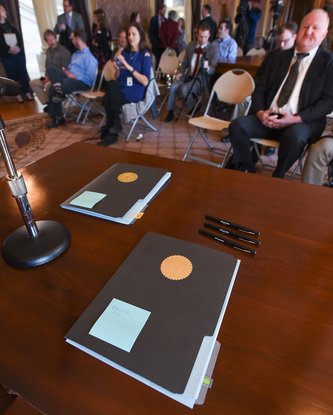 (Francisco Kjolseth  |  The Salt Lake Tribune)  The signing copies of H.B. 472 - Medicaid Expansion Revisions, awaits the signature by Gov. Gary Herbert in the Gold Room of the Utah Capitol on Tuesday, March 27, 2018. The bill would expand Medicaid healthcare coverage to cover an additional 60,000 Utahns below the poverty line — pending approval from the federal government.