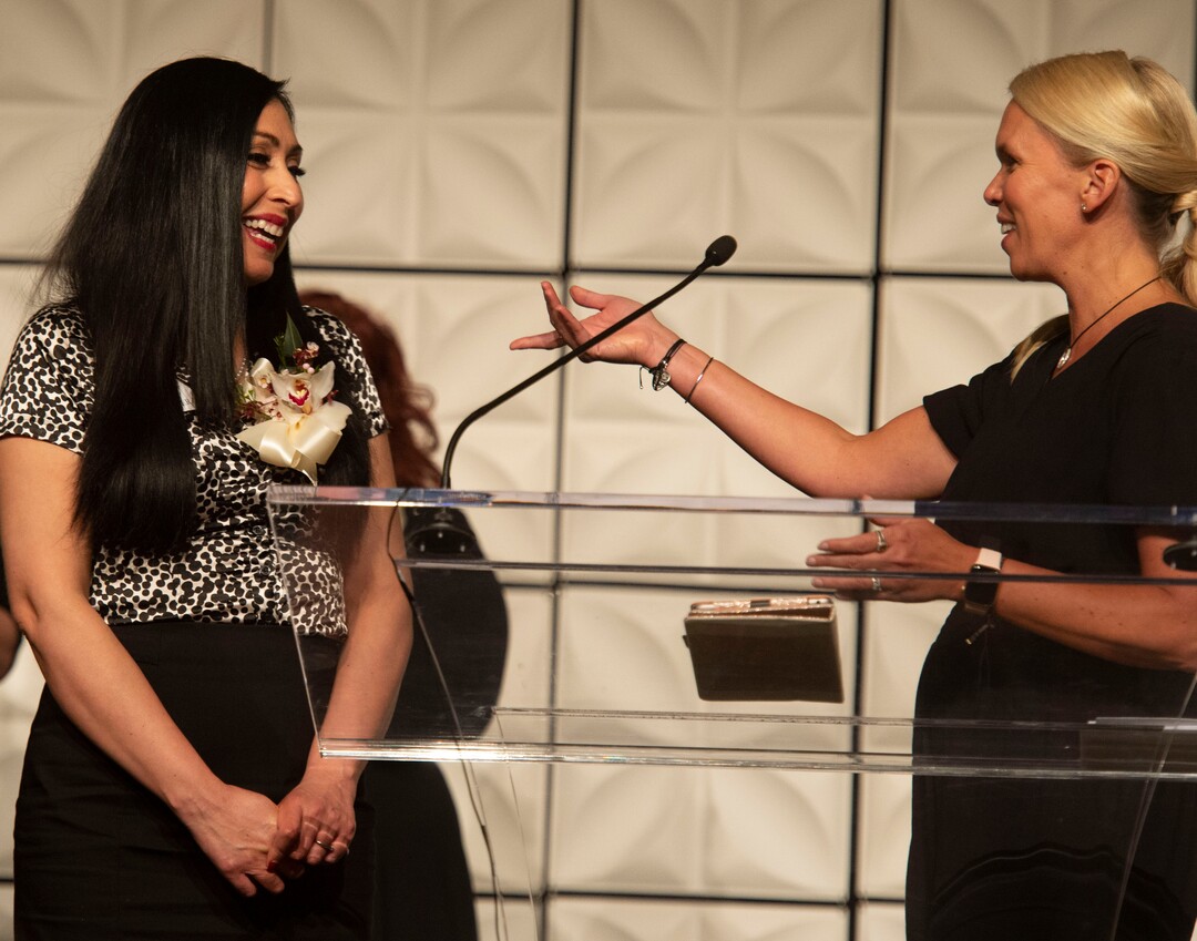 (Rick Egan  |  The Salt Lake Tribune) Education Award winner, Ana Alamo High, 5th grade teacher at Cottonwood Elementary, receives her awards from Jennifer Huntsman Parkin, at the Huntsman Awards for Excellence in Education at the Grand America, Friday,  April 26, 2019.