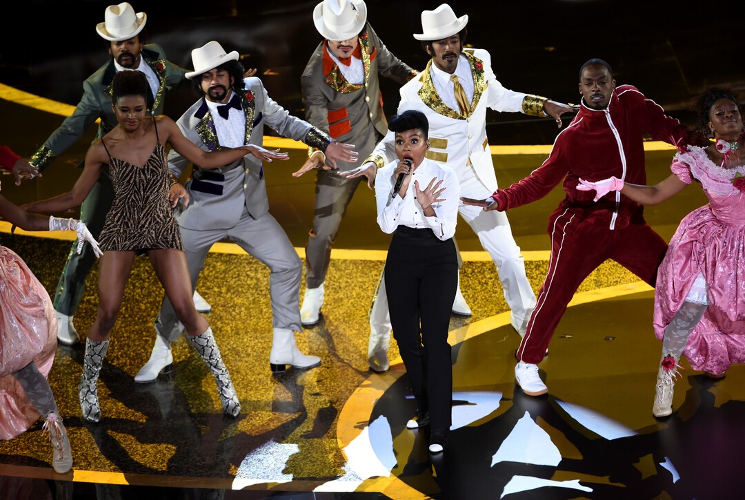 (Chris Pizzello | AP)  Janelle Monae, center, performs onstage at the Oscars on Sunday, Feb. 9, 2020, at the Dolby Theatre in Los Angeles.