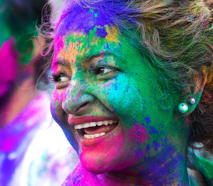 (Rick Egan  |  The Salt Lake Tribune)   
Fanju Jafle, from Pocatello, Idaho, dances at the Holi Festival of Colors celebration at the Sri Sri Radha Krishna Temple in Spanish Fork, Saturday, March 30, 2019.

