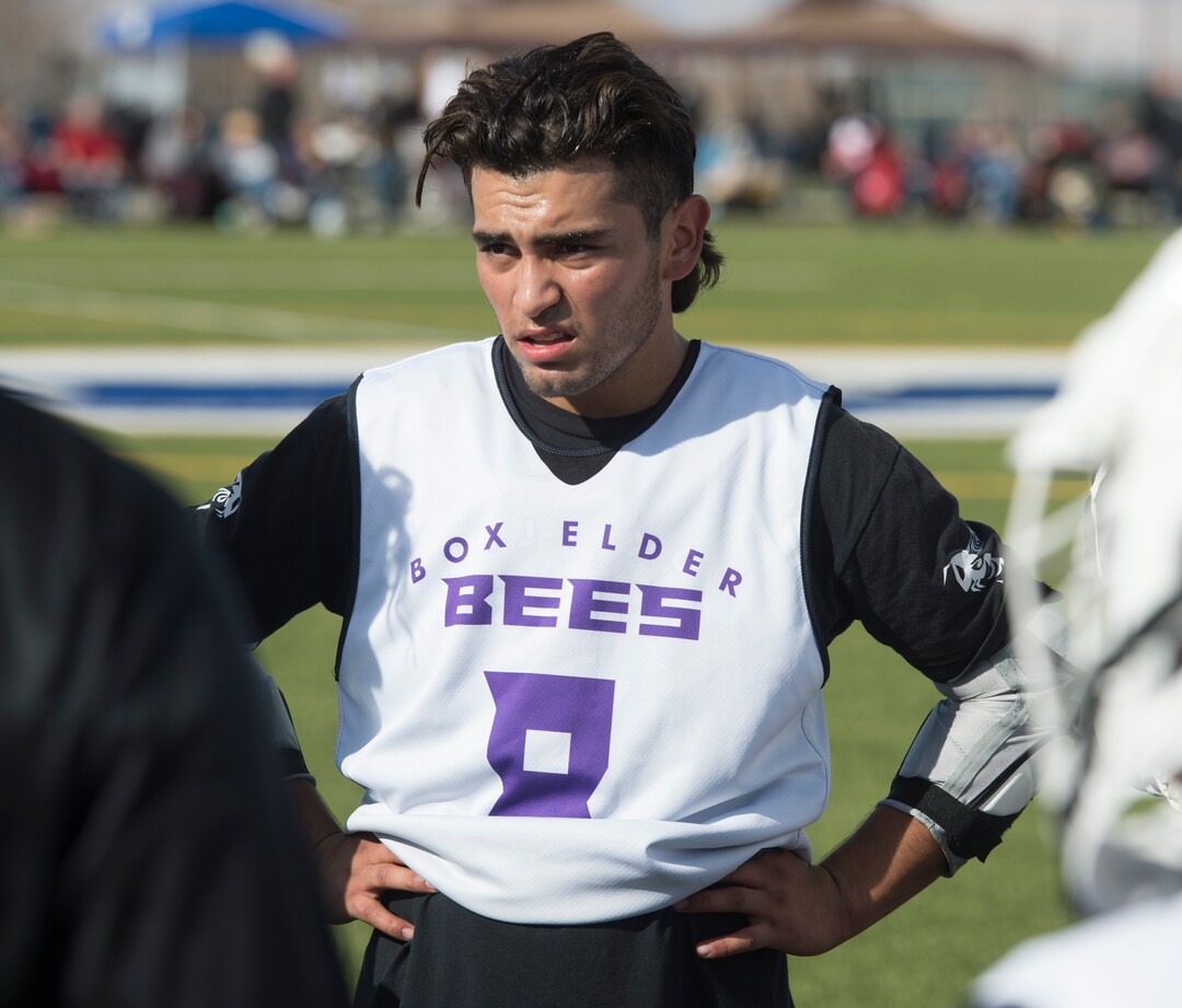 (Rick Egan | The Salt Lake Tribune) Brandyn Gaytan listens to his dad, Box Elder lacrosse coach Juan Gaytan, between games during a tournament in Logan on Saturday, Nov. 3, 2018.