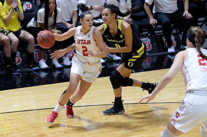 Scott Sommerdorf | The Salt Lake TribuneUtah Utes guard Tori Williams (2) spins around the defense of Oregon Ducks forward Satou Sabally (0) during first half play. Oregon defeated Utah 84-68, Sunday, January 28, 2018.