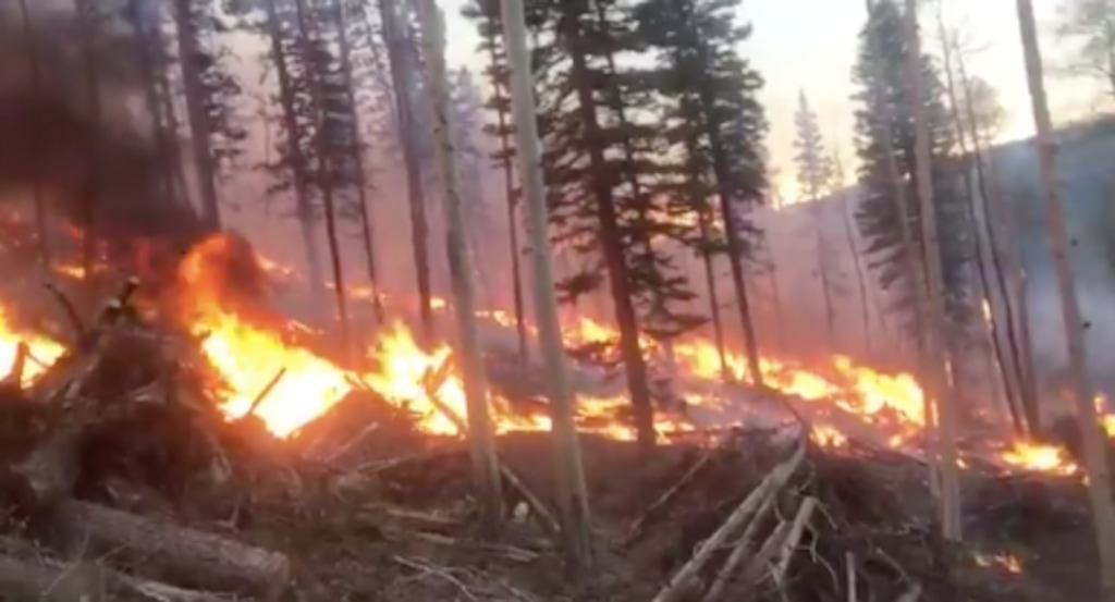 (Screengrab from video by Beaver Ranger District Fuels Specialist Cory Norman) The Three Creeks Fire burns in Beaver County on Monday, Sept. 21, 2020.