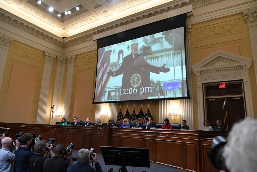 (Kenny Holston | The New York Times)
Video of President Donald Trump addressing many of the supporters who went on to storm the Capitol plays during the first public hearing of the House January 6th committee, on Capitol Hill in Washington on Thursday, June 9, 2022. The committee explicitly declared that Trump committed a crime by conspiring to overturn an election. The attorney general, however, has not weighed in. And a jury of his peers may never hear the case.