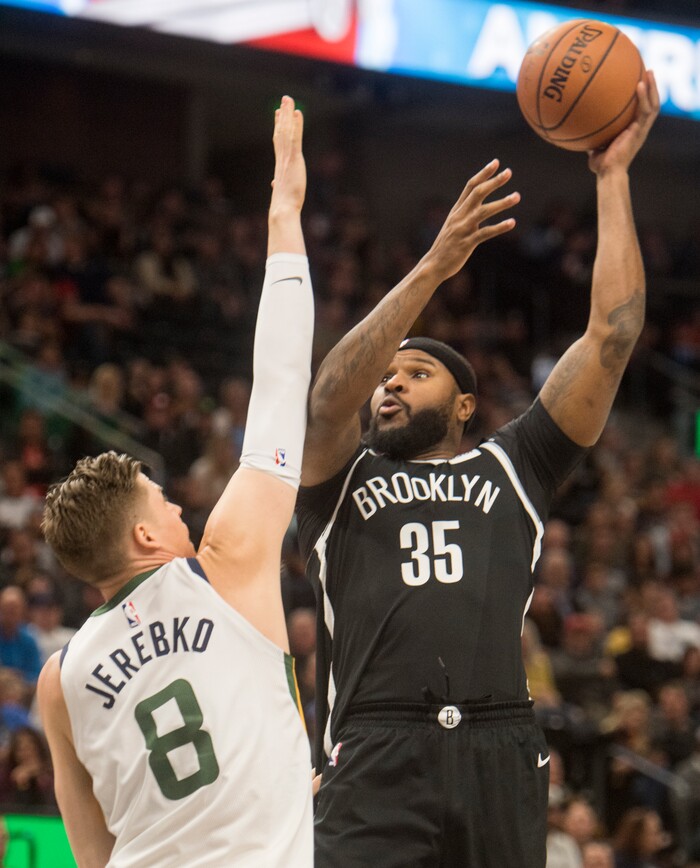 (Rick Egan  |  The Salt Lake Tribune) Brooklyn Nets forward Trevor Booker (35) takes a shot, as Utah Jazz forward Jonas Jerebko (8) defends, in NBA action, Utah Jazz vs. Brooklyn Nets, in Salt Lake City, Saturday, November 11, 2017.