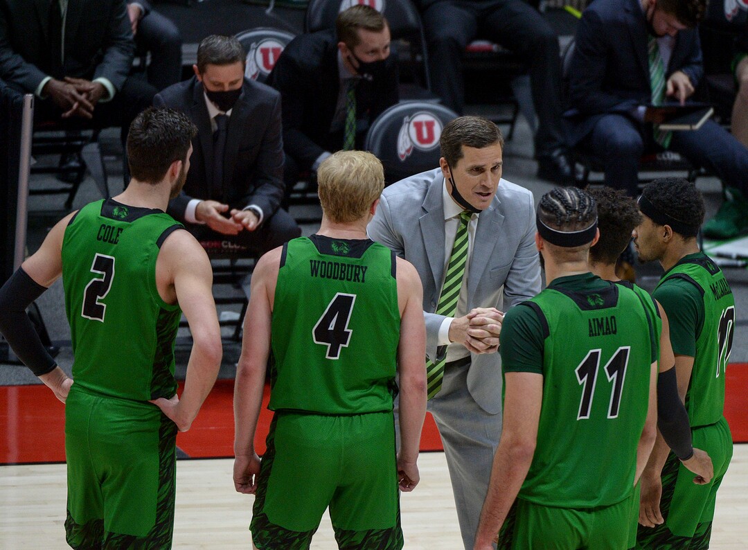(Leah Hogsten  |  The Salt Lake Tribune) Utah Valley Wolverines head coach Mark Madsen rallies his team as the Utes host Utah Valley University on Tuesday, Dec. 15, 2020 at the Jon M. Huntsman Center. The Utes won 75-67.