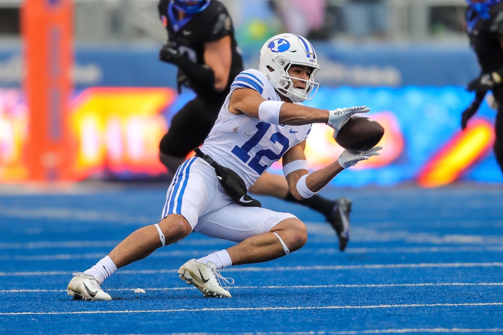 (Steve Conner | AP) BYU wide receiver Puka Nacua (12) catches the ball against Boise State in the first half of an NCAA college football game, Saturday, Nov. 5, 2022, in Boise, Idaho.