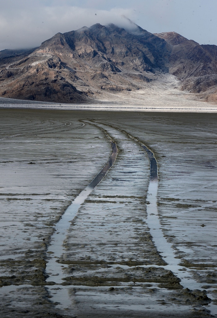 (Steve Griffin / Tribune file photo)  Car tracks in the mud at the end of the road at Bonneville Salt Flats International Speedway, seen here in January 2017.