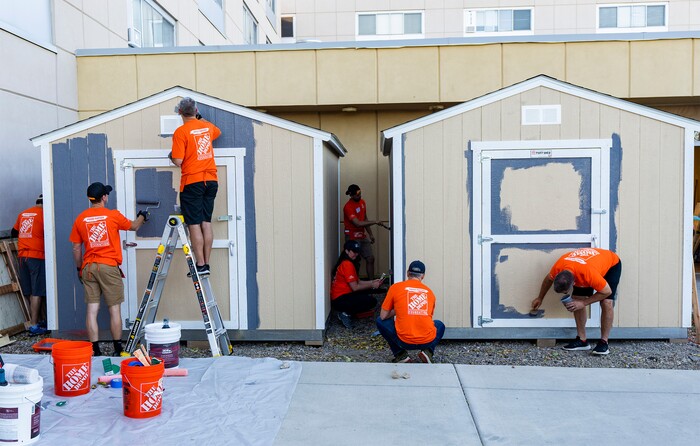 (Rick Egan | The Salt Lake Tribune) More than 600 volunteers, led by Home Depot employees, help spruce up the Sunrise Metro and Freedom Landing apartments in Salt Lake City on Wednesday, Sept. 21, 2022.