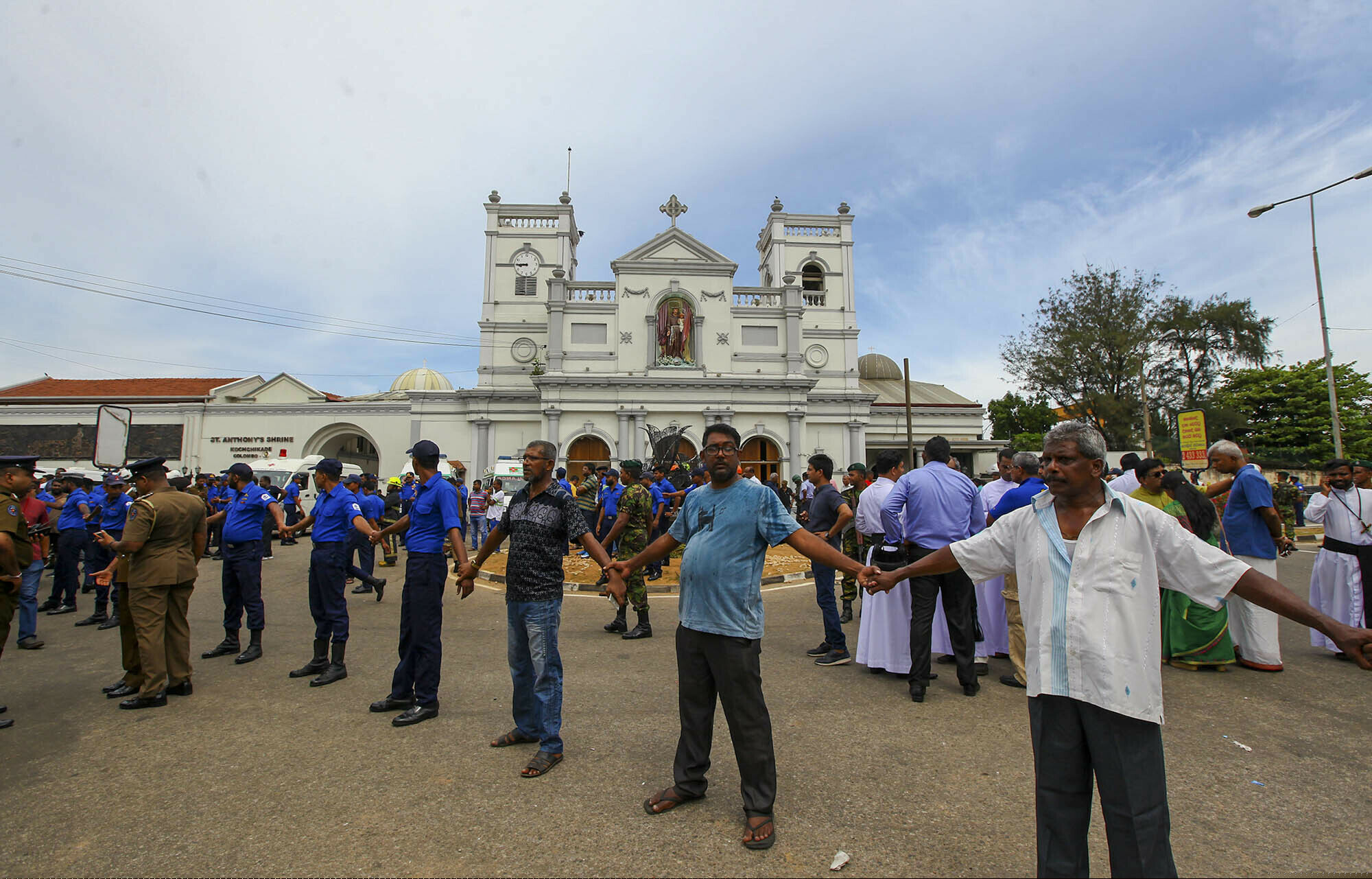 Sri Lankan army soldiers secure the area around St. Anthony's Shrine after a blast in Colombo, Sri Lanka, Sunday, April 21, 2019. More than hundred people were killed and hundreds more hospitalized from injuries in near simultaneous blasts that rocked three churches and three luxury hotels in Sri Lanka on Easter Sunday, a security official told The Associated Press, in the biggest violence in the South Asian country since its civil war ended a decade ago. (AP Photo/ Rohan Karunarathne )