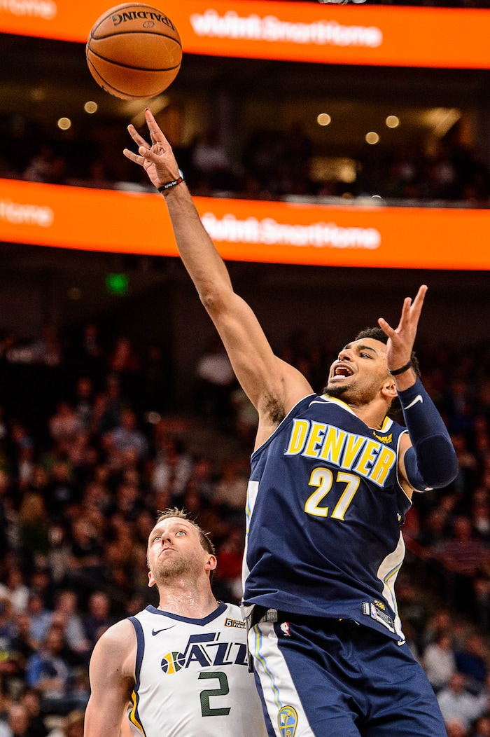 (Trent Nelson | The Salt Lake Tribune)  Denver Nuggets guard Jamal Murray (27) shoots over Utah Jazz forward Joe Ingles (2) as the Utah Jazz host the Denver Nuggets, NBA basketball in Salt Lake City, Wednesday October 18, 2017.