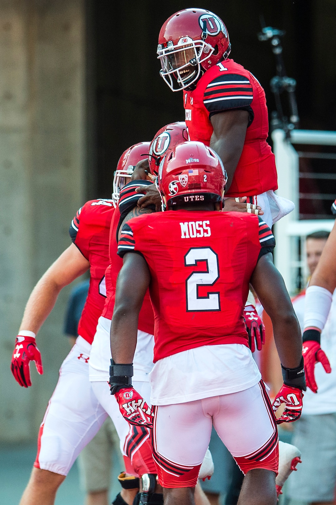(Chris Detrick  |  The Salt Lake Tribune)  Utah Utes quarterback Tyler Huntley (1) celebrates his touchdown with his teammates during the game at Rice-Eccles Stadium Thursday, August 31, 2017. Utah Utes are leading North Dakota Fighting Hawks 17-9 at halftime. 