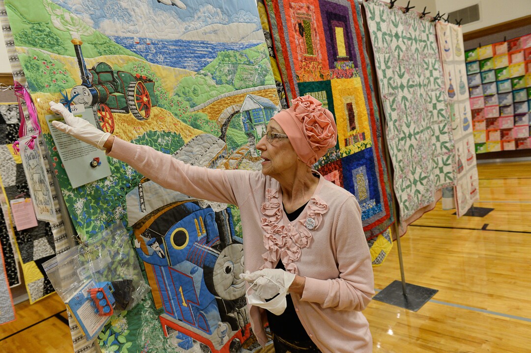 (Francisco Kjolseth  |  The Salt Lake Tribune)  Nacele Hart overlooks her more than 100 quilts and numerous sewing projects created over a 10-year period for her children, grandchildren and great-grandchildren. On Friday at a church in Orem her family put them on display with plans to hand them out Saturday to her loved ones. She's also currently battling cancer.