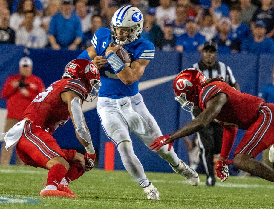 (Rick Egan | The Salt Lake Tribune) Brigham Young Cougars quarterback Jaren Hall (3) runs the ball up the middle, in football action between the Utah Utes and the Brigham Young Cougars at LaVell Edwards Stadium in Provo, on Saturday, Sept. 11, 2021.