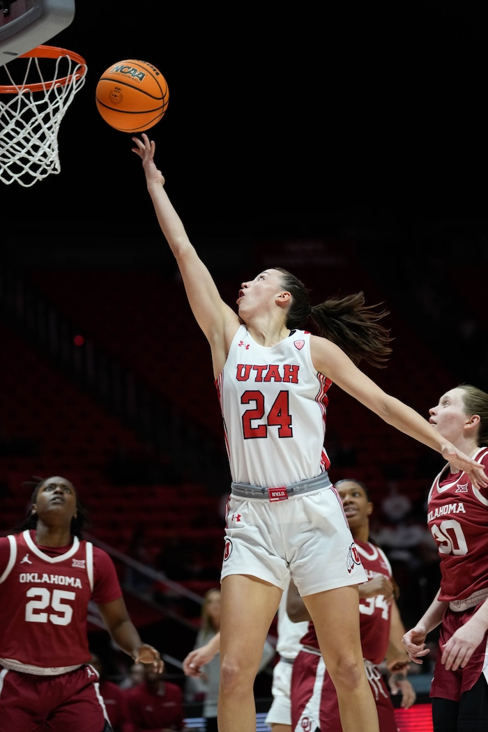(Francisco Kjolseth | The Salt Lake Tribune) Utah Utes guard Kennady McQueen (24) stretches out for a shot as the University of Utah hosts the Oklahoma Sooners in women’s NCAA basketball in Salt Lake City on Wednesday, Nov. 16, 2022.