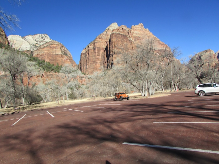 (Tom Wharton | The Salt Lake Tribune) Though the Zion National Park Lodge remains open during the government shutdown, it was a pretty quiet place Sunday as evidenced by the parking lot. Park services have been reduced because of a federal government shutdown that went into effect at midnight Friday after the Senate was unable to pass a new spending bill.