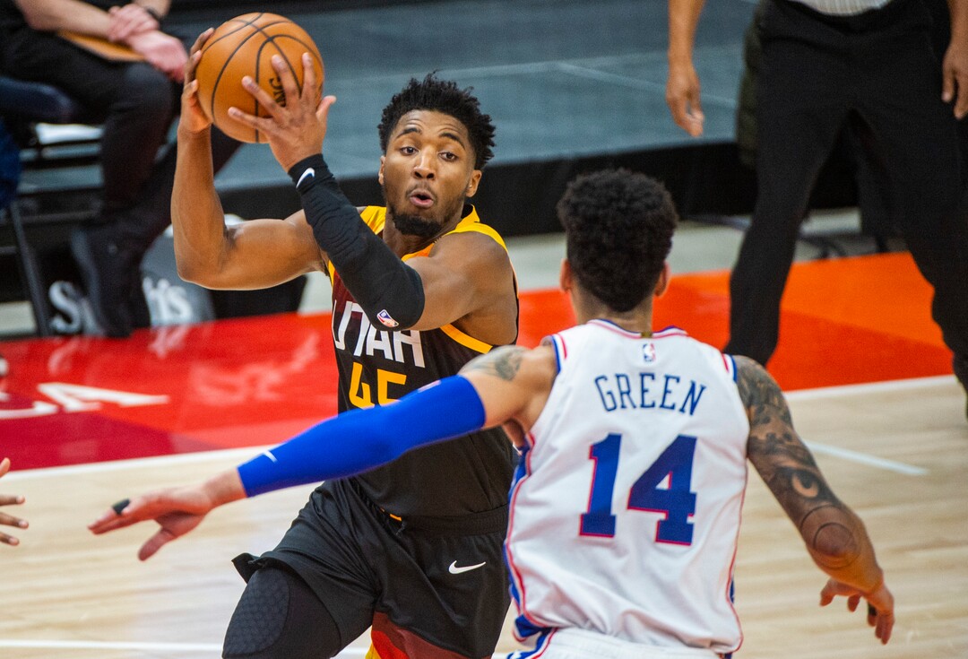 (Rick Egan | The Salt Lake Tribune) Utah Jazz guard Donovan Mitchell (45) looks for a shot as Philadelphia 76ers forward Danny Green (14) defends, in NBA action between the Utah Jazz and the Philadelphia 76ers at Vivint Arena, on Monday, Feb. 15, 2021.