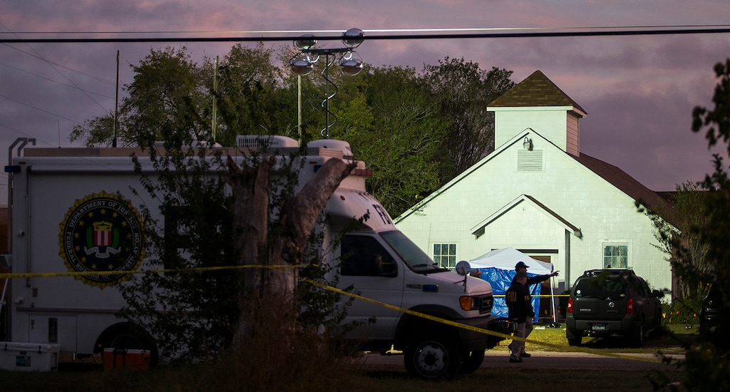 (Nick Wagner | The Austin American-Statesman via The Associated Press) An FBI agent works in front of the First Baptist Church on Monday, Nov. 6, 2017, where a gunman opened fire on a Sunday service in Sutherland Springs, Texas.