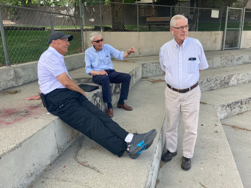 (Leia Larsen | The Salt Lake Tribune) Cottonwood Heights Mayor Mike Peterson, left, resident Jim Peters, center, and developer Victor Merrill discuss the massive volunteer effort it took in the 1970s to build a park on a property owned by The Church of Jesus Christ of Latter-day Saints. The church now wants to sell the property, which is located at 3625 Doverhill Drive, but city residents and those involved in creating the park want it preserved.