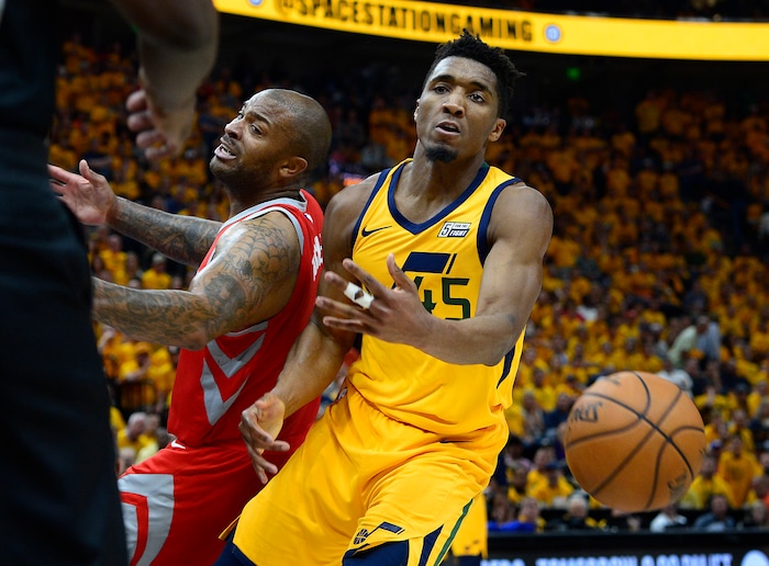 (Scott Sommerdorf | The Salt Lake Tribune)
Utah Jazz guard Donovan Mitchell (45) and Houston Rockets forward PJ Tucker (4) spin after trapping for a second half loose ball. The Rockets beat the Jazz 100-87, Sunday, May 6, 2018.