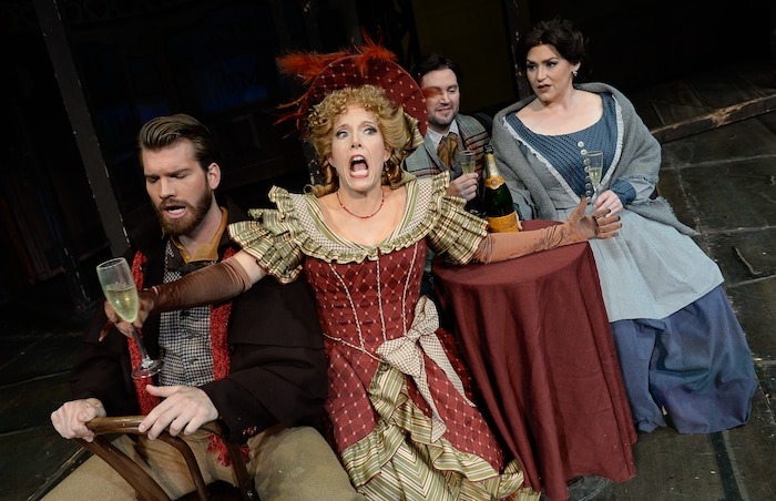 (Francisco Kjolseth  |  The Salt Lake Tribune)  Utah Opera's season opener, "La bohème," Puccini's popular tearjerker about starving artists in turn-of-the-century Paris, opens for five shows on Oct. 7, 2017. On set joking around with the staff during set photos were:  Michael Adams (Marcello), Celena Shafer (Musetta), Jennifer Black (Mimì), Scott Quinn (Rodolfo), from left.