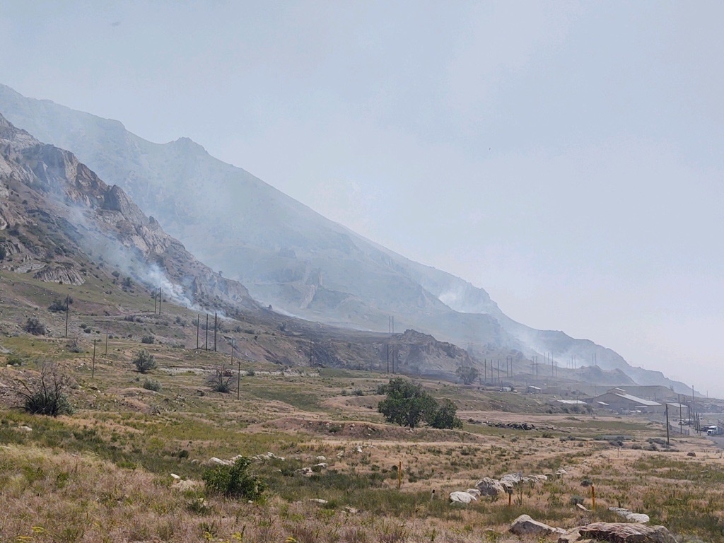 (Utah Fire Info) The Lakeshore Fire is photographed late last week as it burns a few miles west of the Great Saltair. Crews have fully contained the fire.