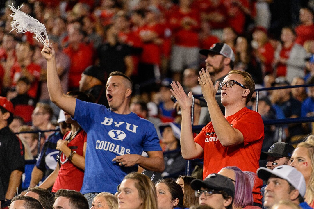 (Trent Nelson | The Salt Lake Tribune)  Fans cheer as BYU hosts Utah, NCAA football in Provo, Saturday September 9, 2017.