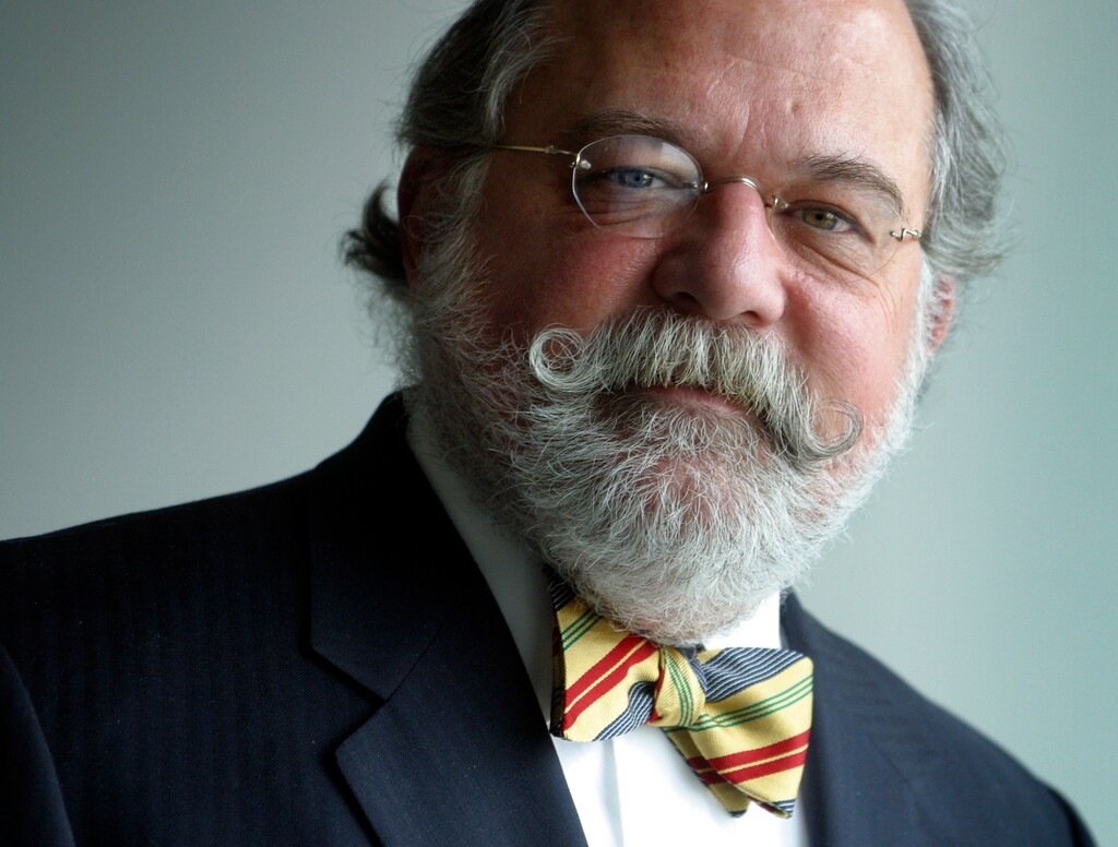 (Jerry Cleveland/The Denver Post via AP) In this Jan. 16, 2004 photo, Denver corporate attorney Ty Cobb poses in the offices of his former law firm, Hogan & Hartson, in Denver. As the government's Russia investigations heat up, a growing cast of lawyers is signing up to defend President Donald Trump and his associates. Trump himself has both an outside legal team and a new in-house special counsel, Cobb, for Russia-related matters.
