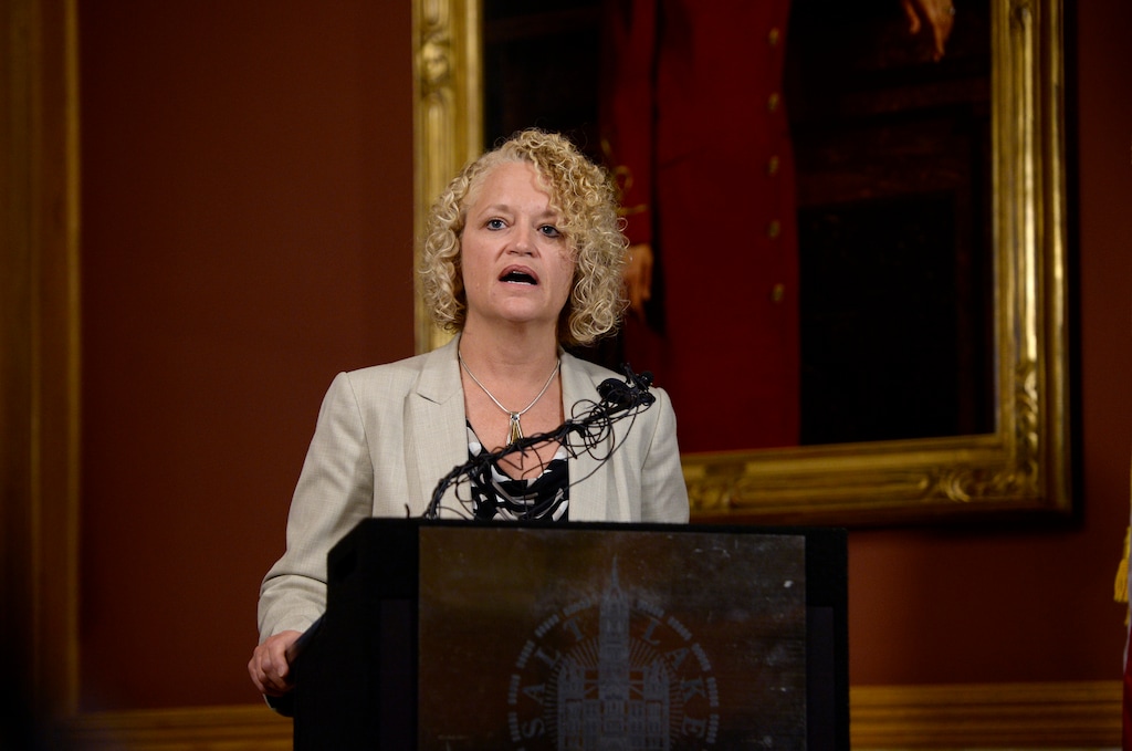 FILE - In this Sept. 13, 2017, file photo, Salt Lake City Mayor Jackie Biskupski speaks in Salt Lake City. A new Associated Press-NORC poll finds that Americans want local officials to do more to battle global warming now that federal officials aren’t. That rings true with Biskupski, who co-chairs two committees of mayors that are fighting climate change. One of her groups has 115 cities committed to the goal of having their cities operating entirely on renewable energy by the year 2035. Salt Lake City is hoping to beat that goal by a few years. “We’re leading the conversation because we have to now,” Biskupski said. “Here we are with the president coming out against supporting the Paris agreement, now we really ramped things up with the mayors across the country.” (Scott Sommerdorf/The Salt Lake Tribune via AP)