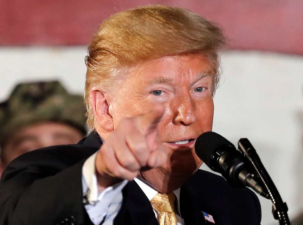 U.S. President Donald Trump speaks to U.S. servicemen at U.S. Navy multipurpose amphibious assault ship USS Wasp at the U.S. Navy's Yokosuka base in Yokosuka, south of Tokyo Tuesday, May 28, 2019. (AP Photo/Eugene Hoshiko)