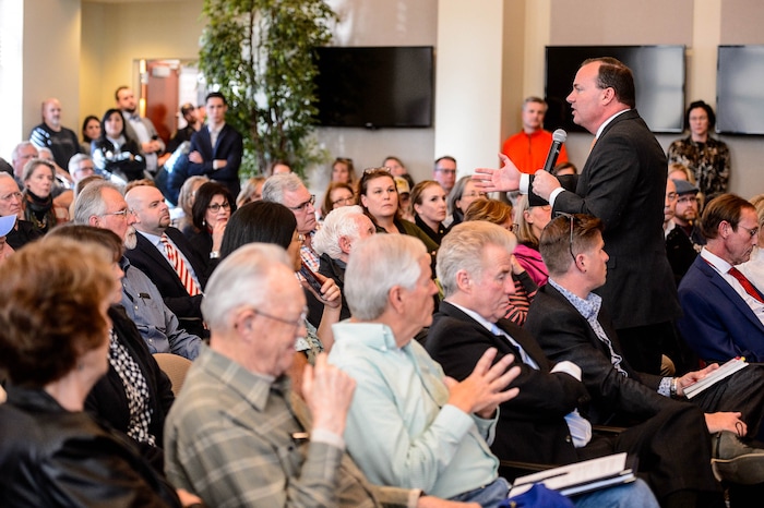 (Trent Nelson  |  The Salt Lake Tribune) Sen. Mike Lee answers questions at a town hall in Draper on Wednesday, Feb. 19, 2020.