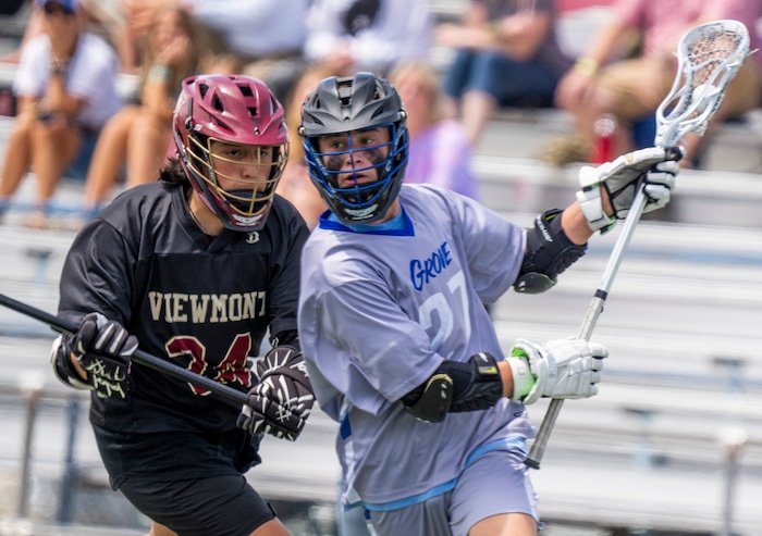 (Rick Egan | The Salt Lake Tribune) Jaden Allen chases Sean Bezzant (27) Pleasant Grove, in the Division C championship game between the Viewmont Vikings and the Pleasant Grove Vikings, in Layton, on Saturday, May 29, 2021.