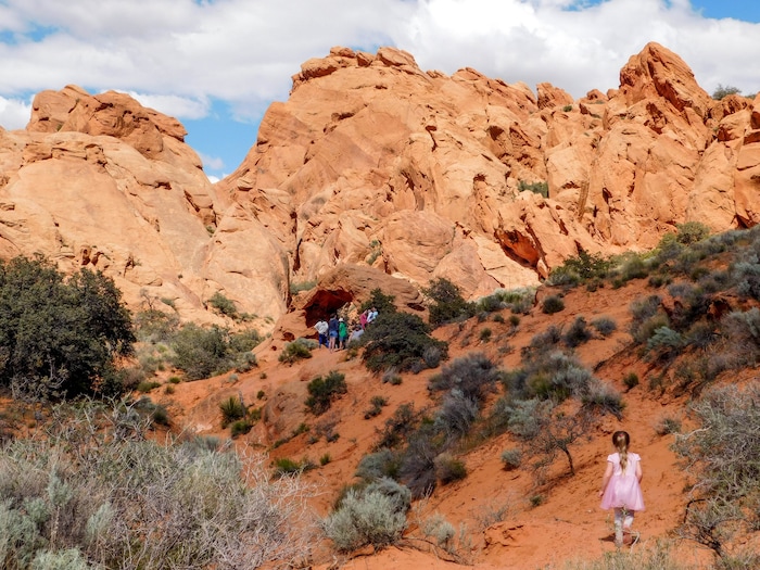 Erin Alberty  |  The Salt Lake TribuneHikers gather under Babylon Arch on April 1, 2017 in the Red Cliffs Desert Reserve near Leeds.