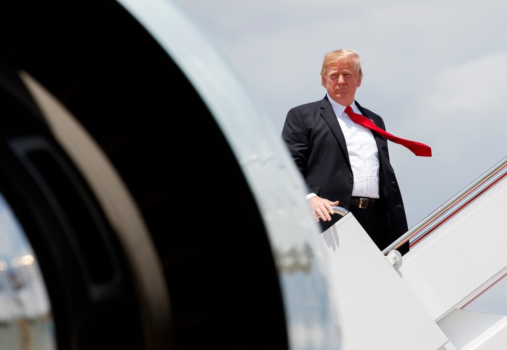 President Donald Trump boards Air Force One, Thursday, July 5, 2018, at Andrews Air Force Base, Md., en route to a rally in Great Falls, Mont. (AP Photo/Carolyn Kaster)