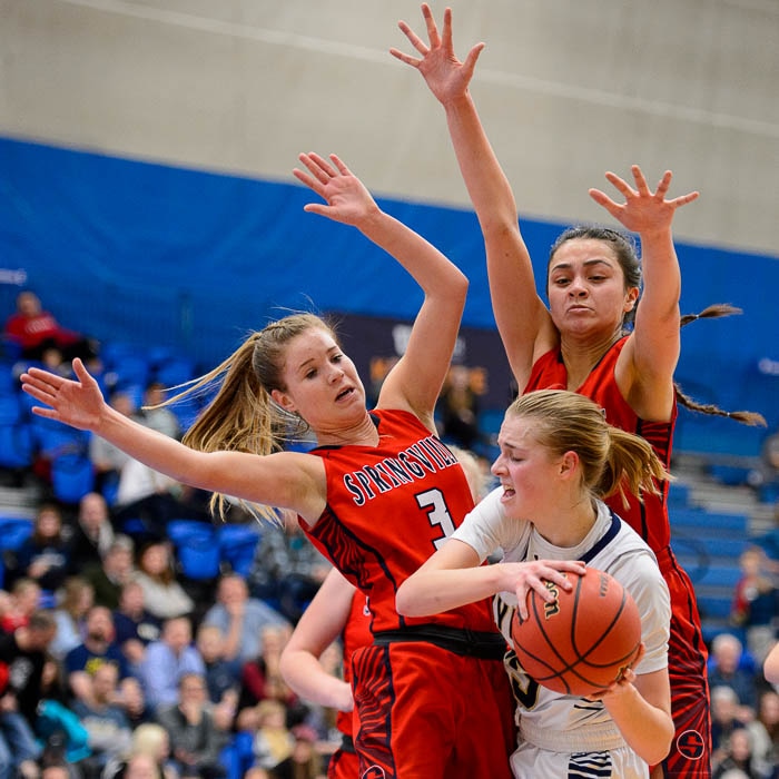 (Trent Nelson | The Salt Lake Tribune)  Springville's Breanna Eves (3) and Springville's Kallysta Strong (11) defend Skyline's Madison Grange (25) as Skyline faces Springville in the 5A High School Girls' Basketball Tournament at SLCC in Taylorsville, Wednesday Feb. 21, 2018.
