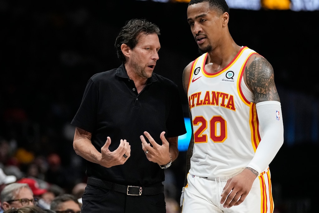 (John Bazemore | AP) Atlanta Hawks coach Quin Synder talks with forward John Collins during the first half of the team's NBA basketball game against the Washington Wizards, Wednesday, April 5, 2023, in Atlanta.