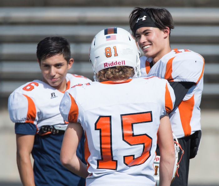 (Rick Egan  |  The Salt Lake Tribune)  Ogden football players joke around during practice. The mood at practice has changed after the team broke its 36-game losing streak last week. Wednesday, September 13, 2017.