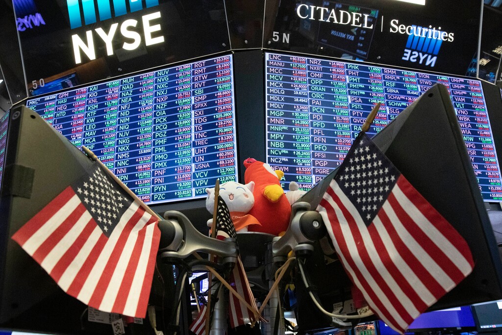 FILE - In this Sept. 18, 2019, file photo, stock prices are displayed at the New York Stock Exchange. (AP Photo/Mark Lennihan, File)
