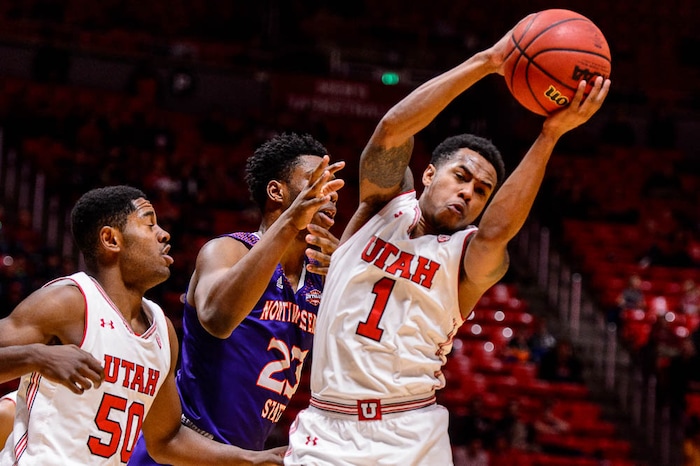(Trent Nelson | The Salt Lake Tribune)  Utah Utes guard Justin Bibbins (1) grabs a rebound ahead of Northwestern State Demons forward Darian Dixon (23) as the University of Utah hosts Northwestern State, NCAA basketball in Salt Lake City, Wednesday December 20, 2017.
