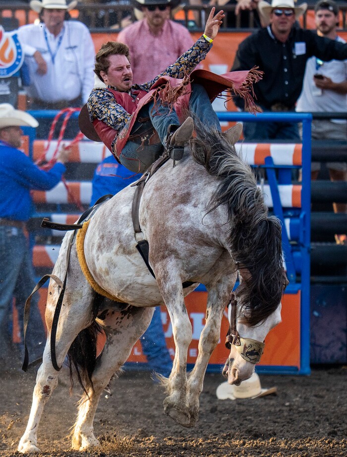 (Rick Egan | The Salt Lake Tribune) Dean Thompson, from Altamont, Utah, competes in the bareback riding competition at the Utah Days of '47 Rodeo at the State Fairpark, on Monday, July 25, 2022.