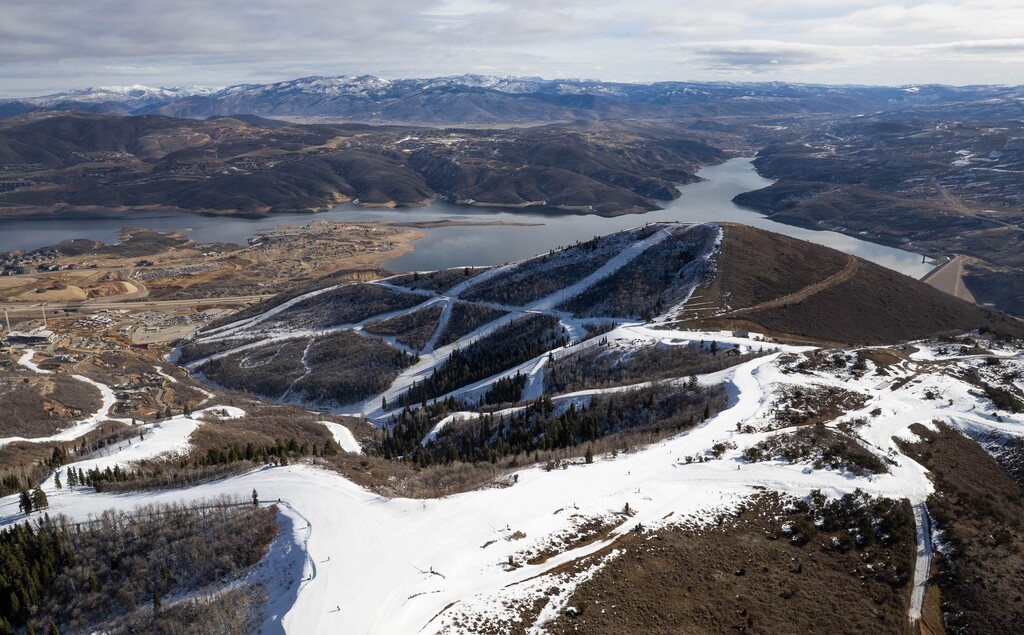 (Francisco Kjolseth | The Salt Lake Tribune) Little snow covers the mountain above the Deer Valley East Village on Tuesday, Feb. 3, 2026.