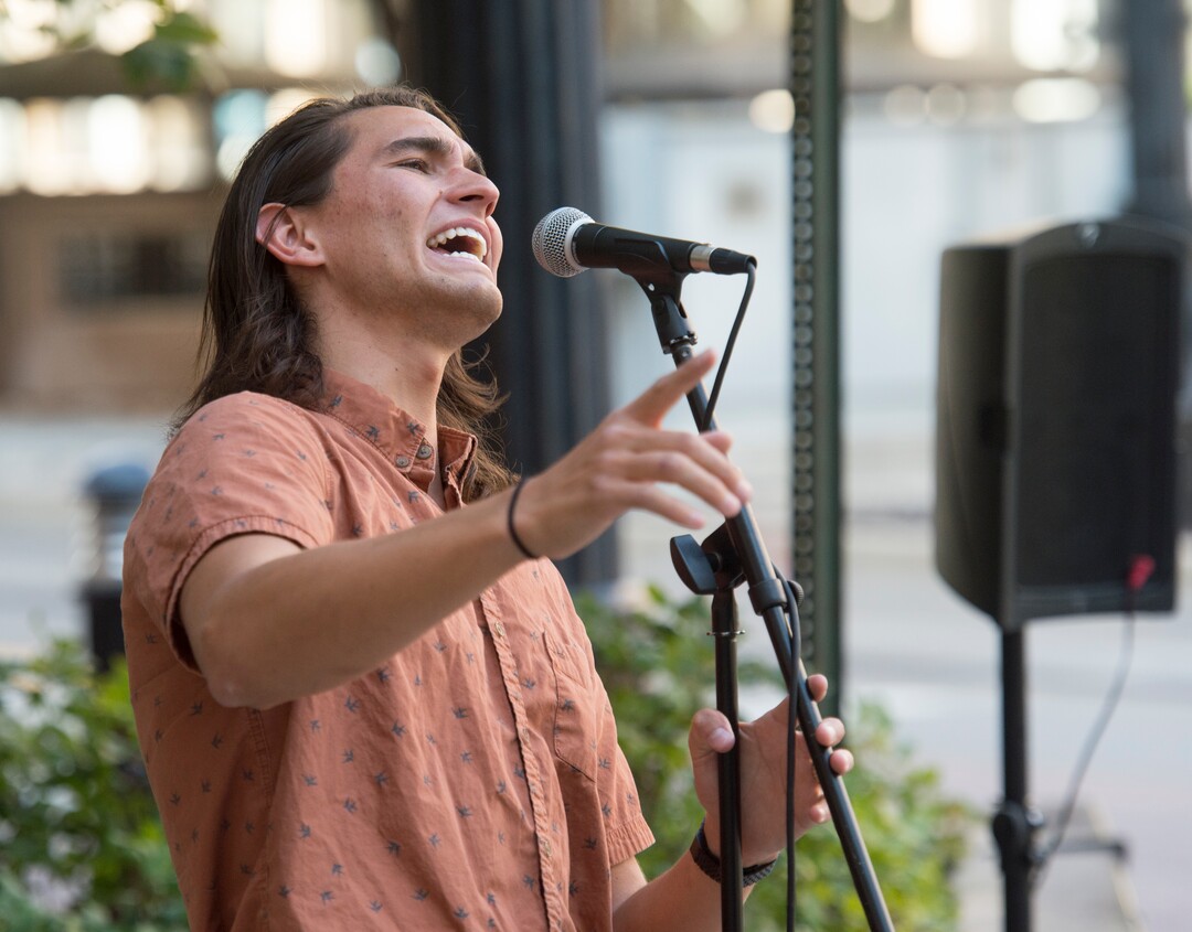 (Rick Egan  |  The Salt Lake Tribune)   Dallin Mcallister performs on Main Street in Salt Lake City.  The first Salt Lake Busker Festival is set for Aug. 24 on Regent Street, bringing together street musicians, magicians, jugglers and other performers. Thursday, Aug. 16, 2018.