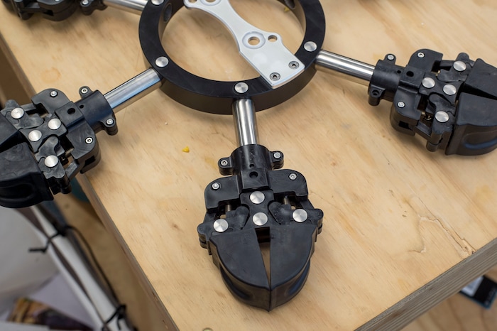 (Zack Wittman  |  For The Washington Post)  Robotic claws that are used pick berries are displayed on Wednesday, Feb. 6, 2019, at G & D Farms in Duette, Florida.