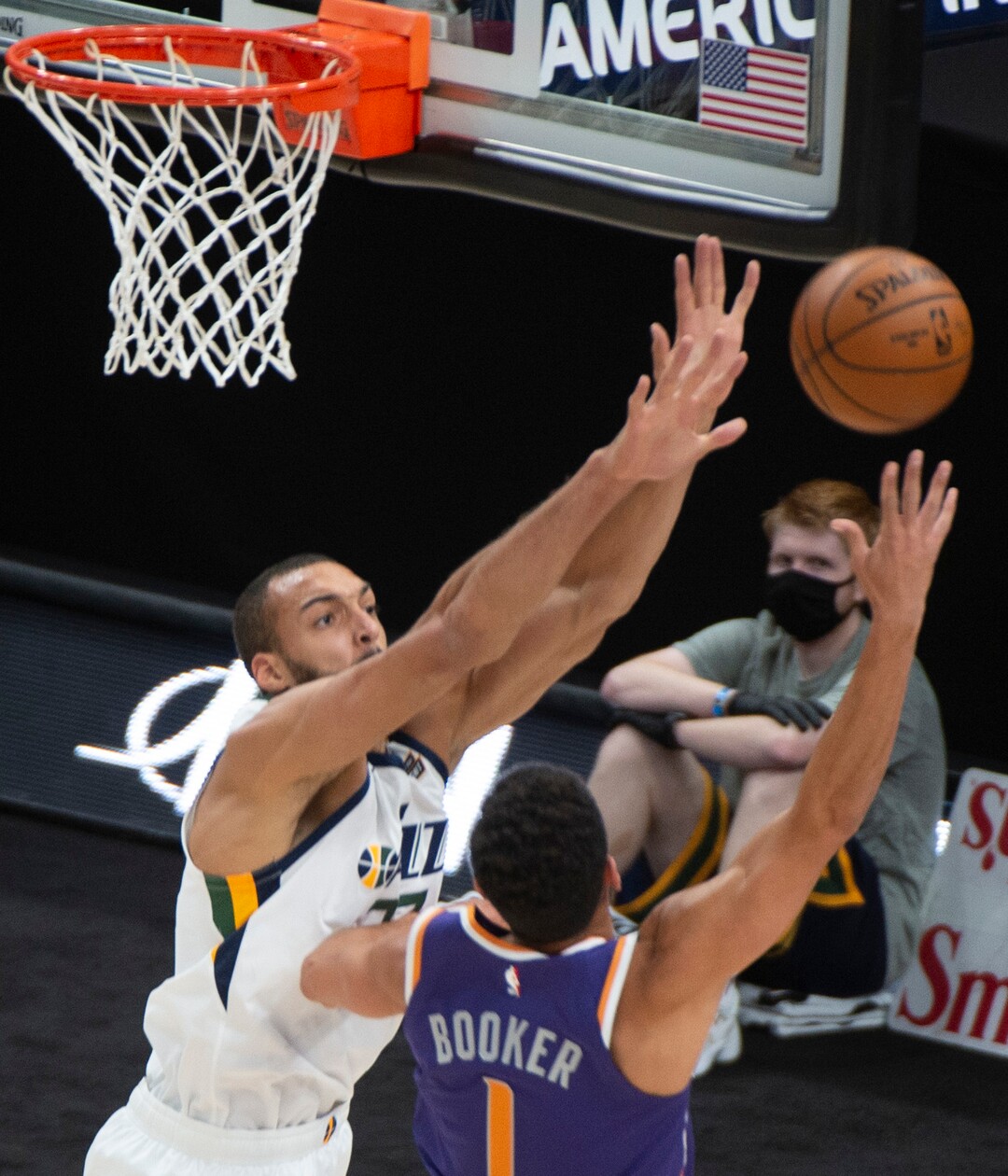 (Rick Egan | The Salt Lake Tribune) Phoenix Suns guard Devin Booker (1) shoots over Utah Jazz center Rudy Gobert (27), in preseason NBA action between Utah Jazz and Phoenix Suns at Vivint SmartHome Area, on Saturday, Dec. 12, 2020.