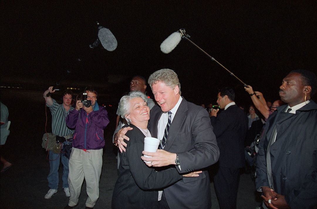 (George Frey  |  AP photo) Democratic presidential candidate Gov. Bill Clinton is all smiles as he shares a welcoming hug with Norma Matheson, the wife of the late Utah governor Scott Matheson, upon Clinton's arrival at the Salt Lake City airport in Utah on Monday, Sept. 15, 1992. Clinton was in town to address members of the 114th General Conference of the National Guard Association of the U.S. on Tuesday.