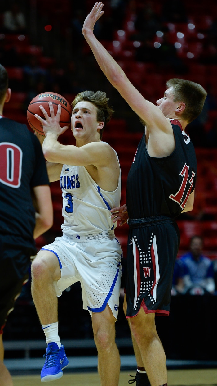 (Francisco Kjolseth  |  The Salt Lake Tribune)  Weber vs Pleasant Grove, 6A State high school basketball tournament at the Huntsman Center in Salt Lake City, Thursday March 1, 2018. Pleasant Grove's Casey Brown looks for an opening past Weber. 