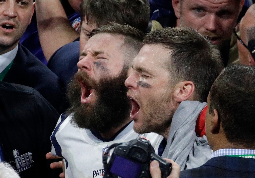 New England Patriots' Julian Edelman, left, and Tom Brady celebrate after the NFL Super Bowl 53 football game against the Los Angeles Rams, Sunday, Feb. 3, 2019, in Atlanta. The Patriots won 13-3. (AP Photo/Charlie Riedel)