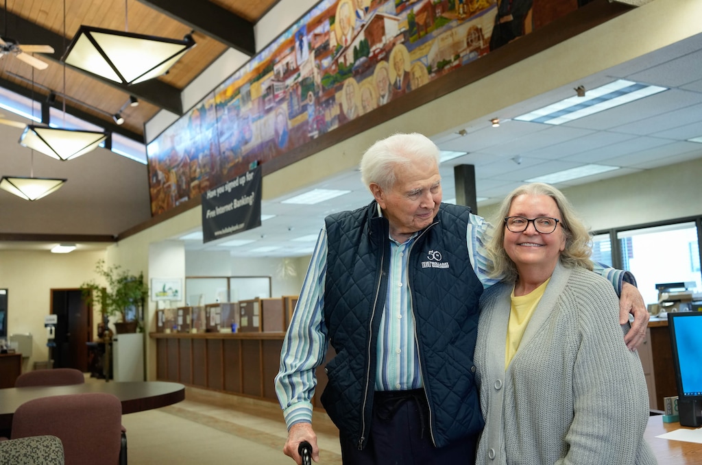 (Francisco Kjolseth | The Salt Lake Tribune) Ron N. Spratling Jr., founder of Holladay Bank & Trust, poses with his daughter Katie Spratling inside the bank established in 1974. Katie Spratling will remain as the bank’s president, following the bank’s acquisition by Black-owned Redemption Holding Co.